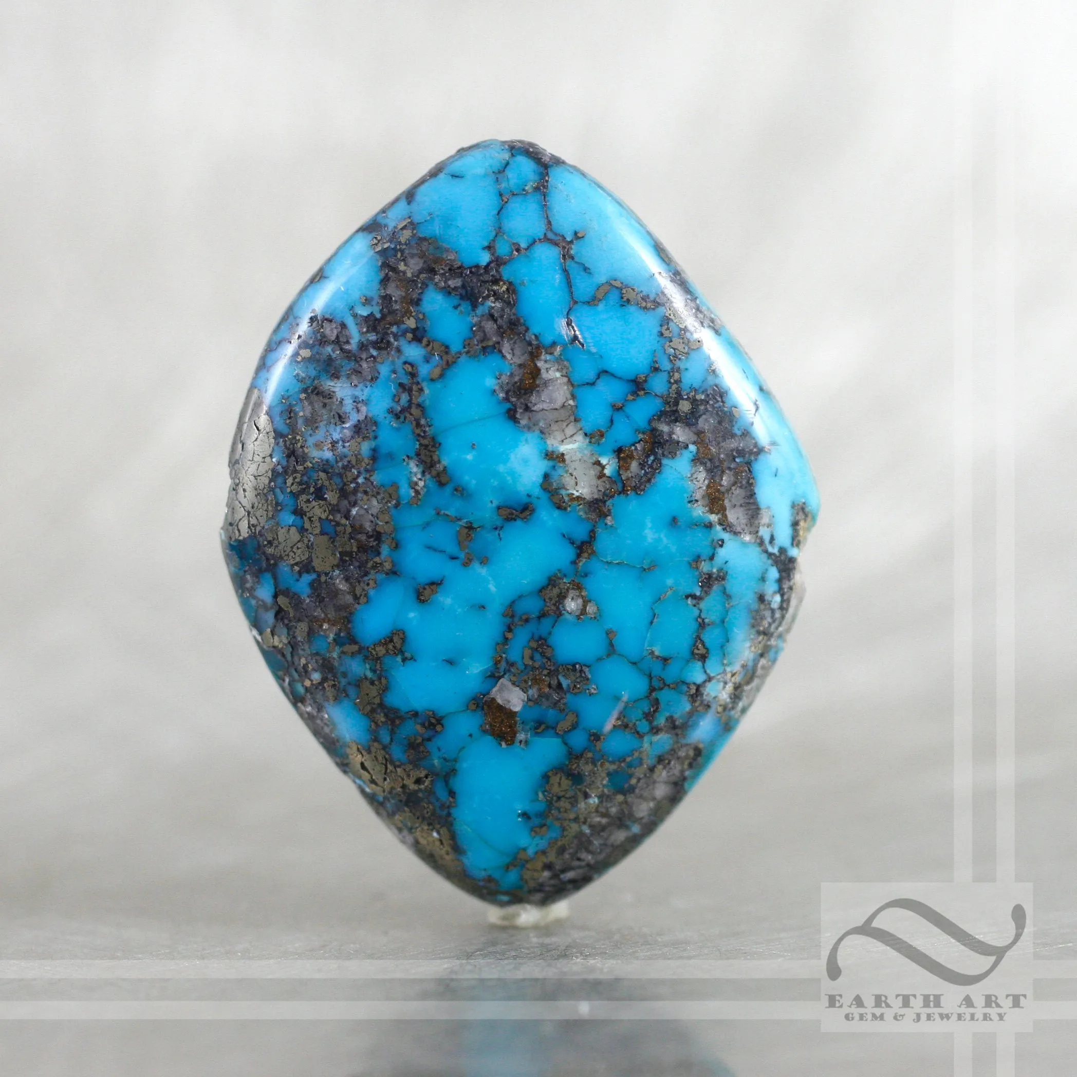 68.6 ct loose Kingman turquoise freeform cabochon